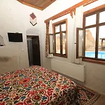 Отель Local Cave House 3*