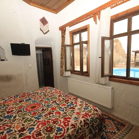 فندق Local Cave House 3*